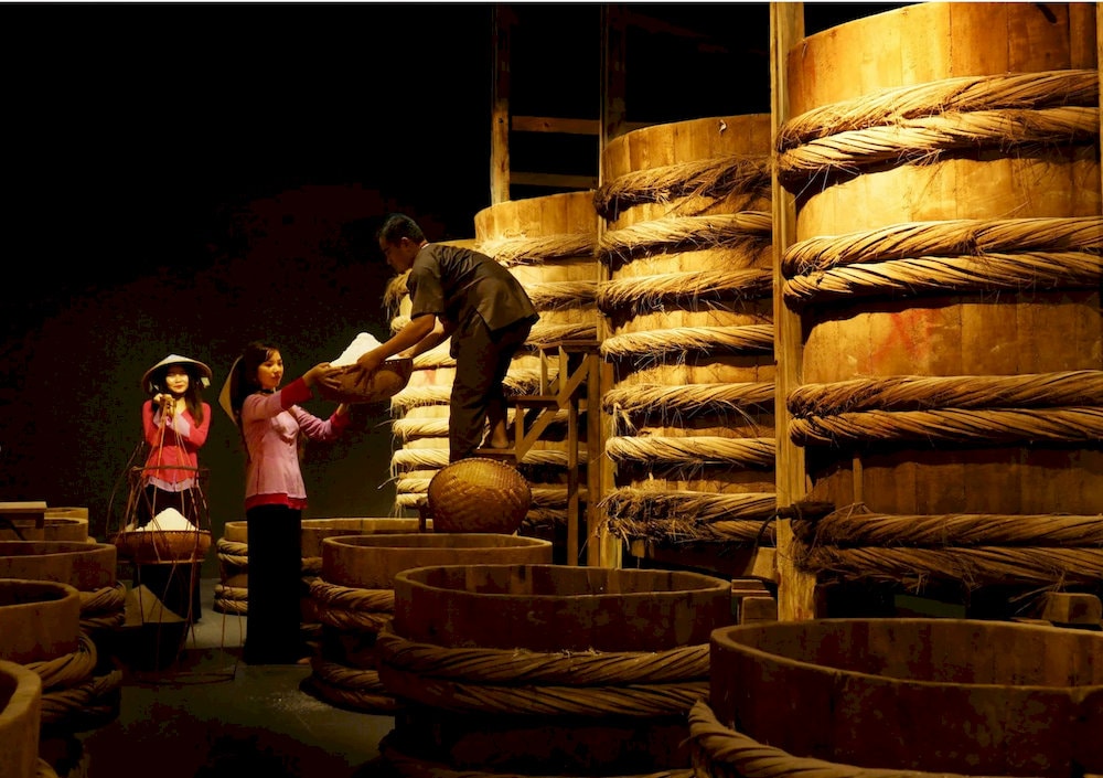 Visitors can explore museums and fish sauce factories sheltered from the rain 